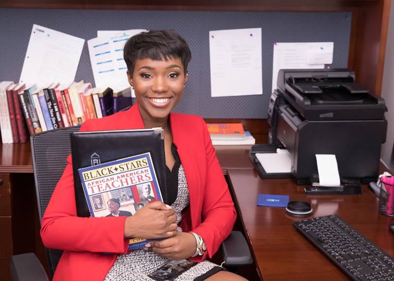 Smiling business person with Red jacket
